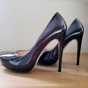 Prada Patent Leather Platform Pumps in Deep Plum/Black